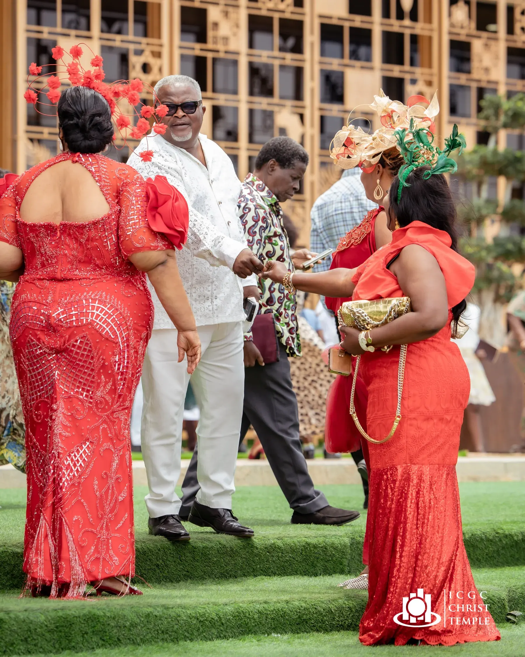 Church members greeting one another outside Christ Temple
