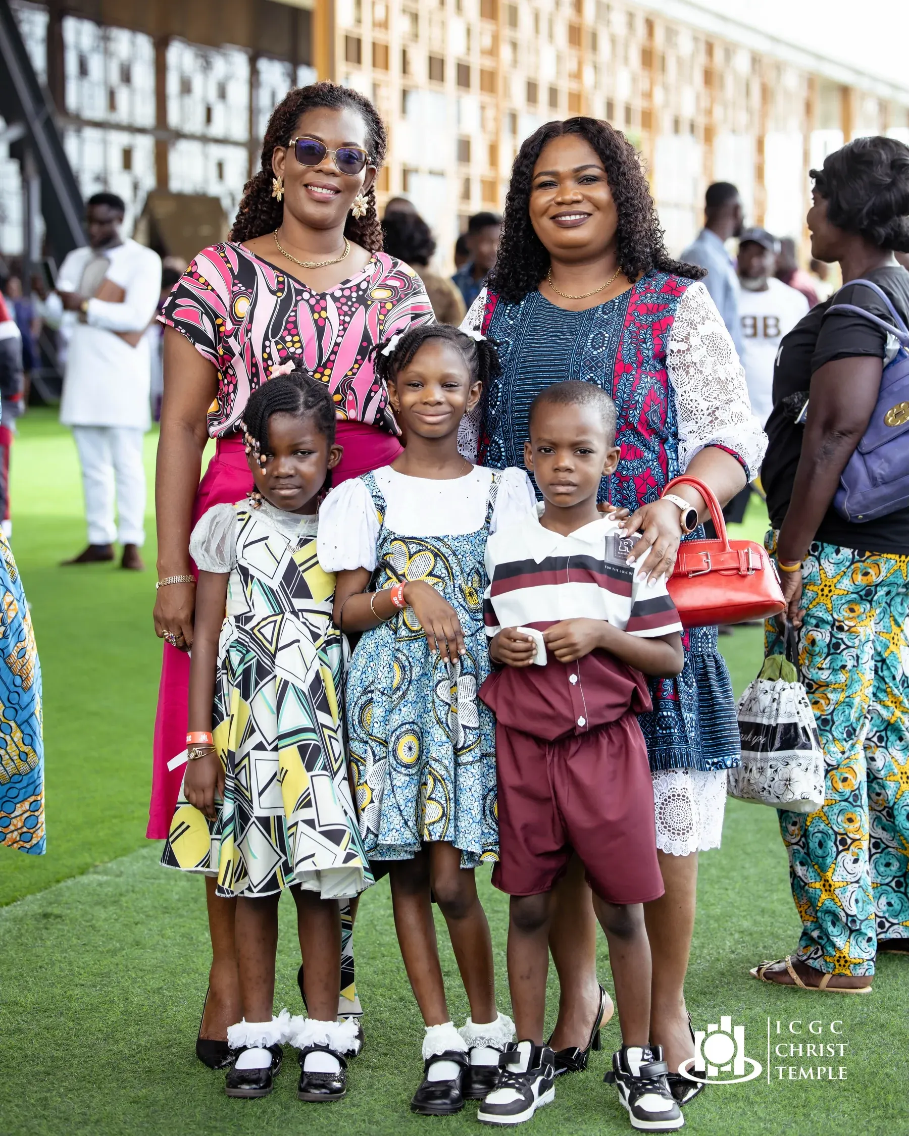 Mothers and children together outside Christ Temple